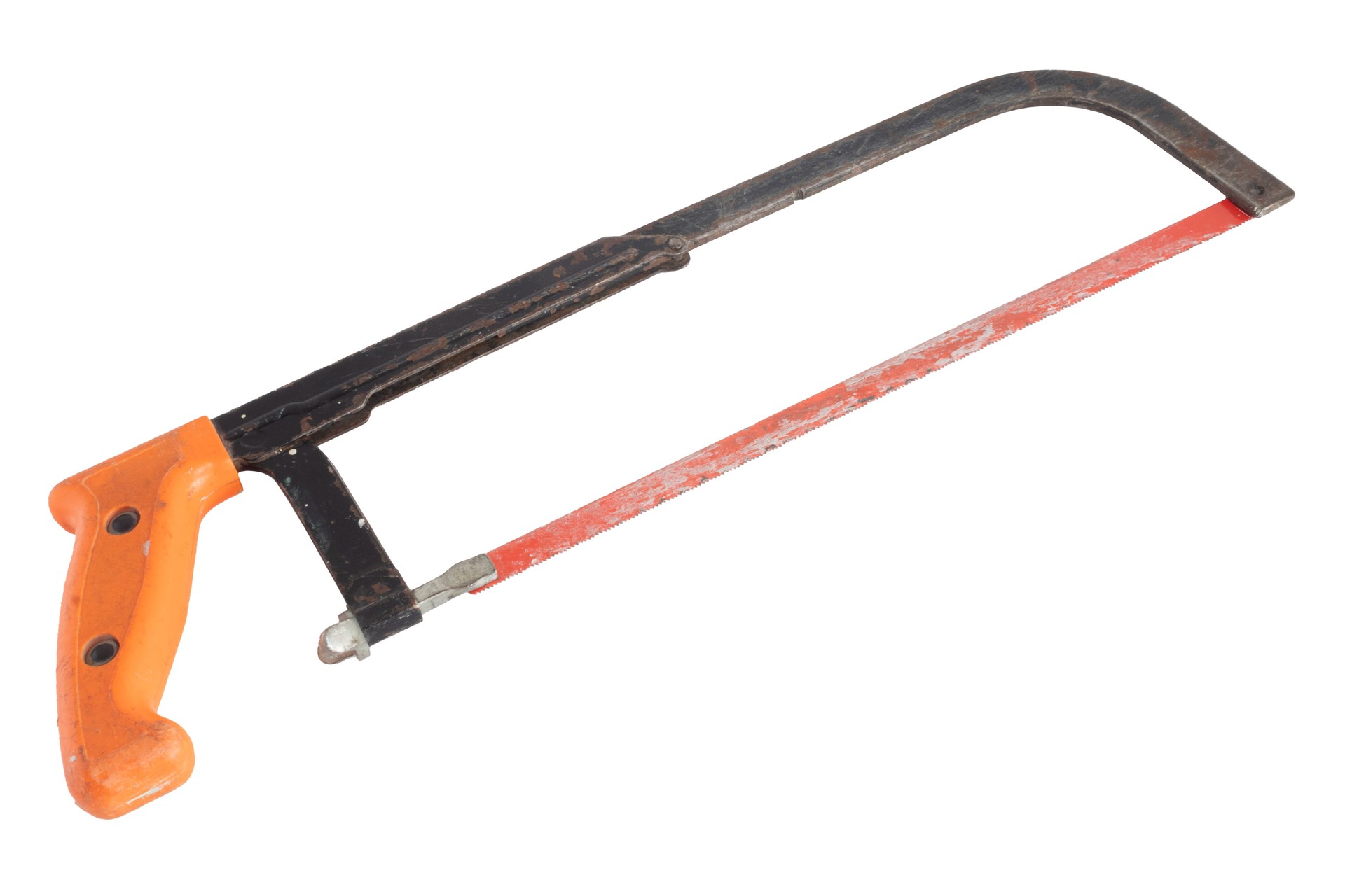 Old orange and black Hacksaw isolated on white background. Worn cutting tool.